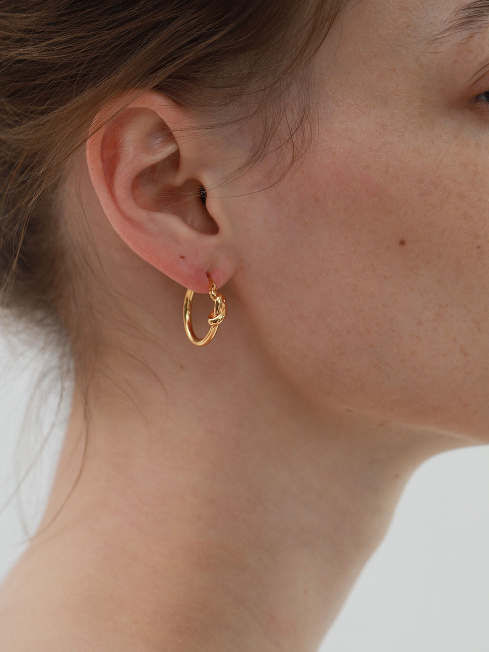 Fiore Gold Dainty Knot Huggie Hoop Earrings