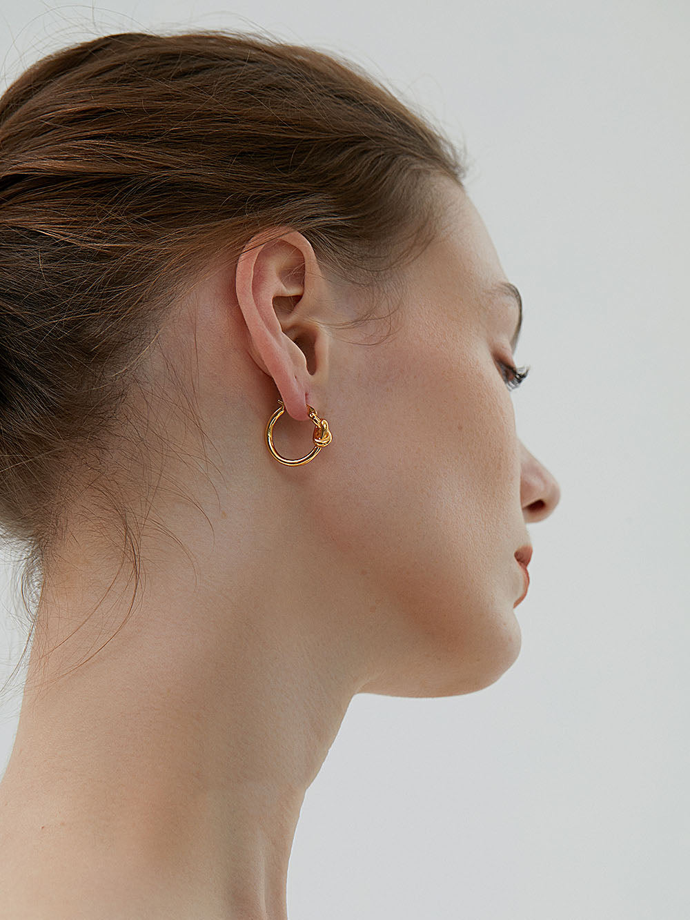 Fiore Gold Dainty Knot Huggie Hoop Earrings